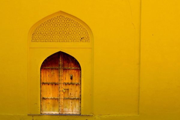 Old Door with Yellow Wall